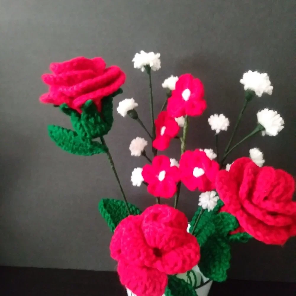 Handmade crochet bouquet of red roses,